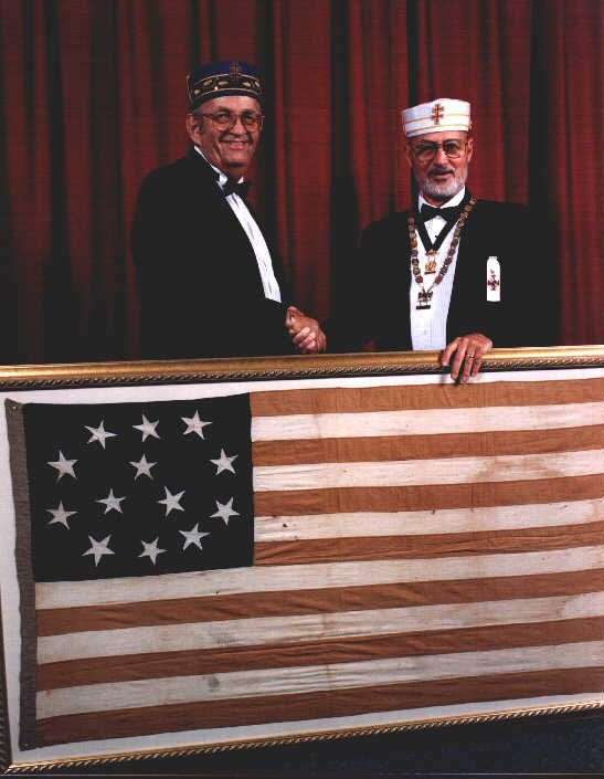  framed 13-star American flag to the Lake Worth Scottish Rite Foundation.